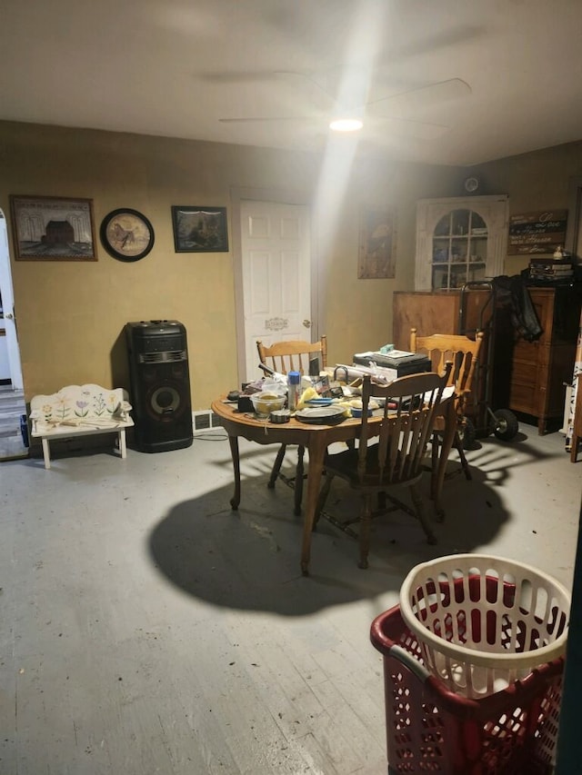 dining space featuring wood-type flooring