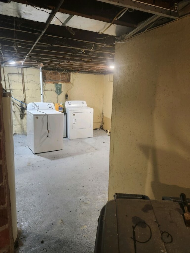 basement featuring washer and dryer