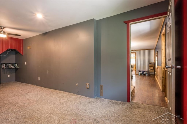 spare room featuring dark hardwood / wood-style floors and ceiling fan