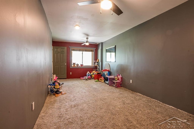 game room featuring carpet flooring and ceiling fan