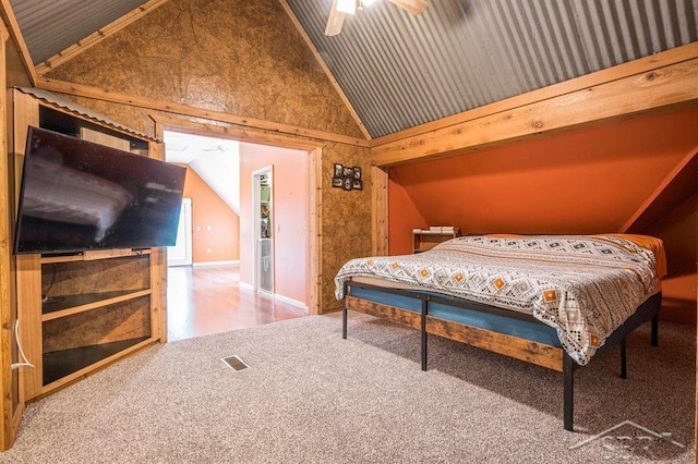 carpeted bedroom featuring ceiling fan and lofted ceiling