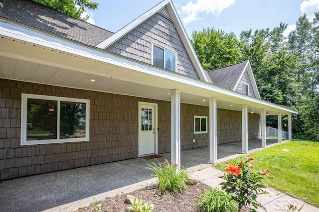 exterior space featuring a patio and a front yard