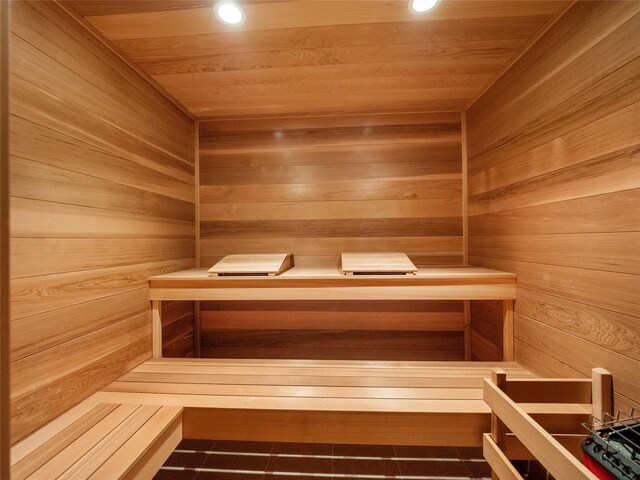 2756 Turtle Bluff Dr, Bloomfield Hills, MI 48302 - relaxing sauna / steam room with wooden ceiling, recessed lighting, and wood walls