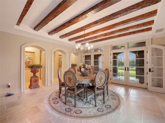 dining space with beamed ceiling, a notable chandelier, ornamental molding, and french doors