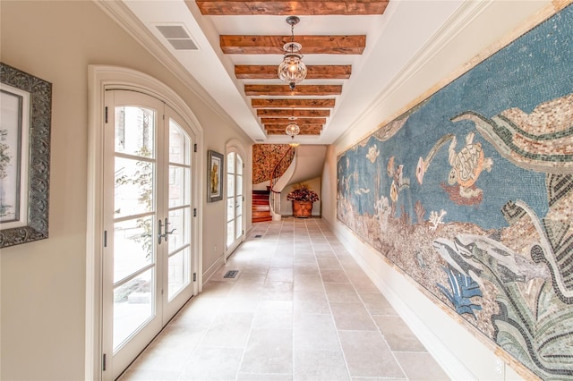 hall with beamed ceiling, light tile patterned flooring, and french doors