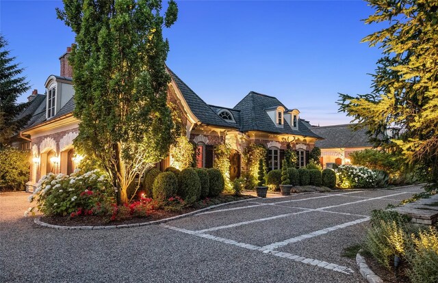 2756 Turtle Bluff Dr, Bloomfield Hills, MI 48302 - french country inspired facade with a chimney