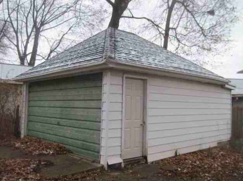 view of outdoor structure with a garage