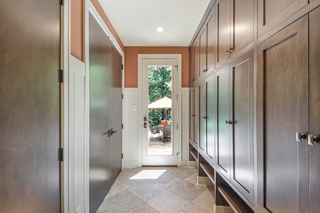 mudroom with light tile patterned floors