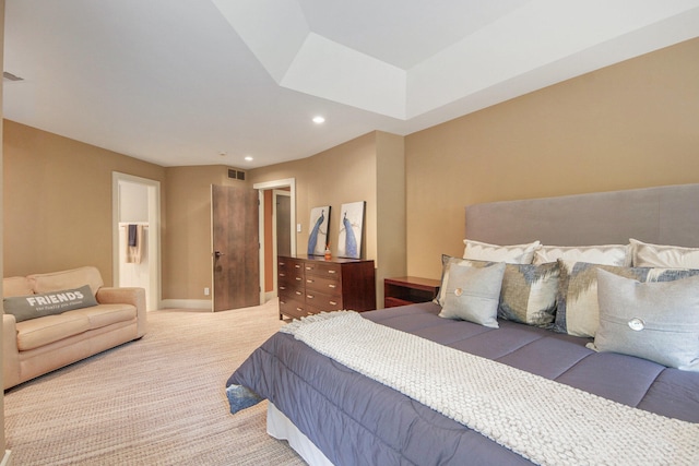 bedroom featuring light colored carpet