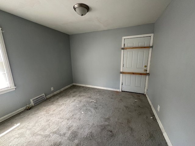 empty room with carpet floors