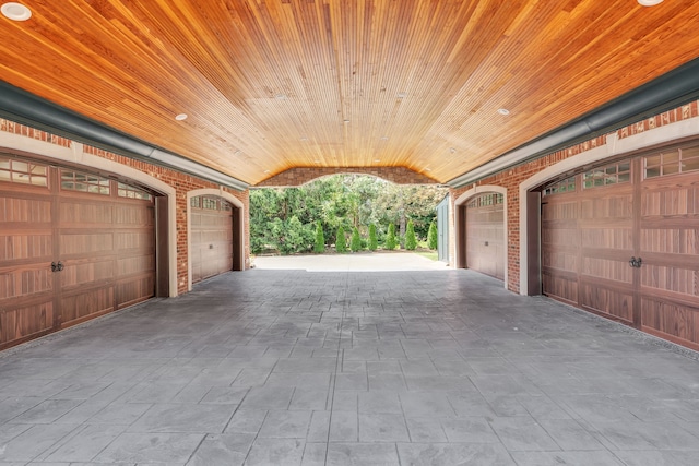 garage with wooden walls and wooden ceiling