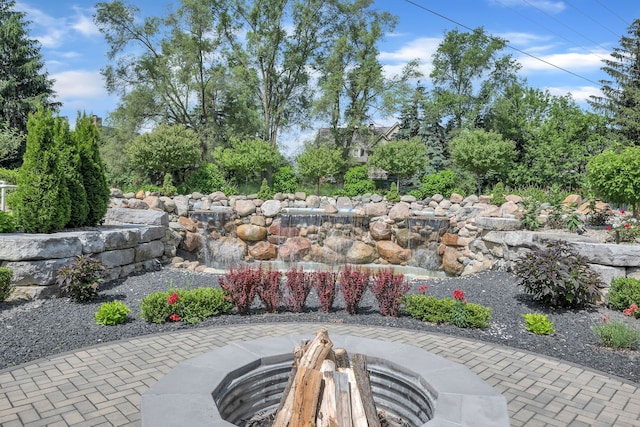 view of patio / terrace with a fire pit