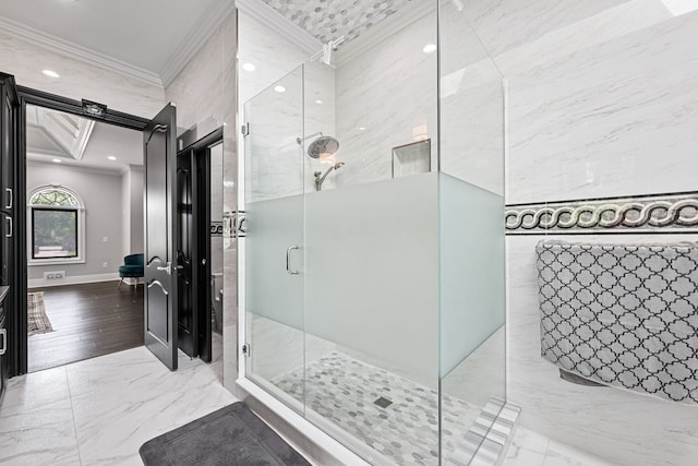 bathroom with crown molding, hardwood / wood-style floors, and a shower with shower door