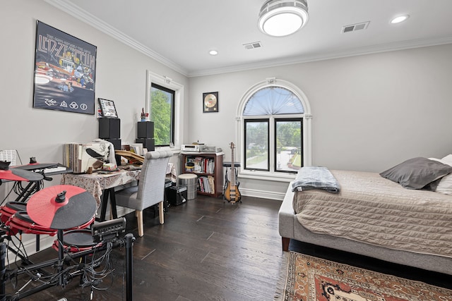 bedroom with dark hardwood / wood-style flooring and ornamental molding