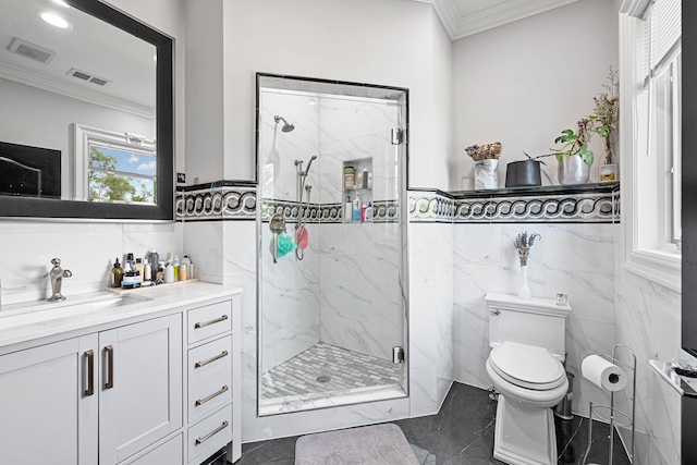 bathroom with vanity, toilet, tile walls, and crown molding