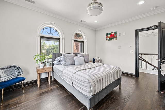 bedroom featuring dark hardwood / wood-style floors and ornamental molding