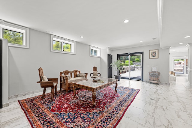 living room with a wealth of natural light and ornamental molding