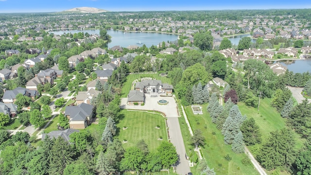 bird's eye view with a water and mountain view