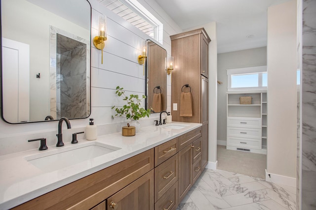 bathroom featuring vanity and a shower