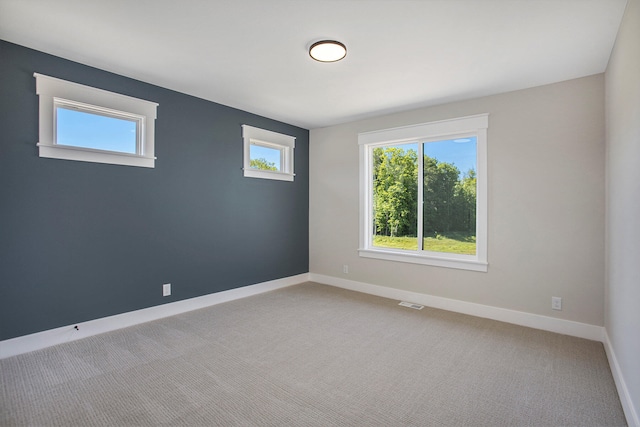 view of carpeted spare room