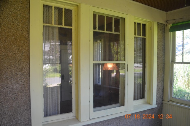 156 Western Ave, Benton Harbor, MI 49022 - view of exterior entry with stucco siding