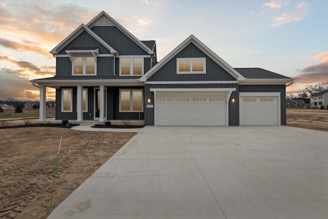 craftsman house featuring a porch, concrete driveway, roof with shingles, and an attached garage