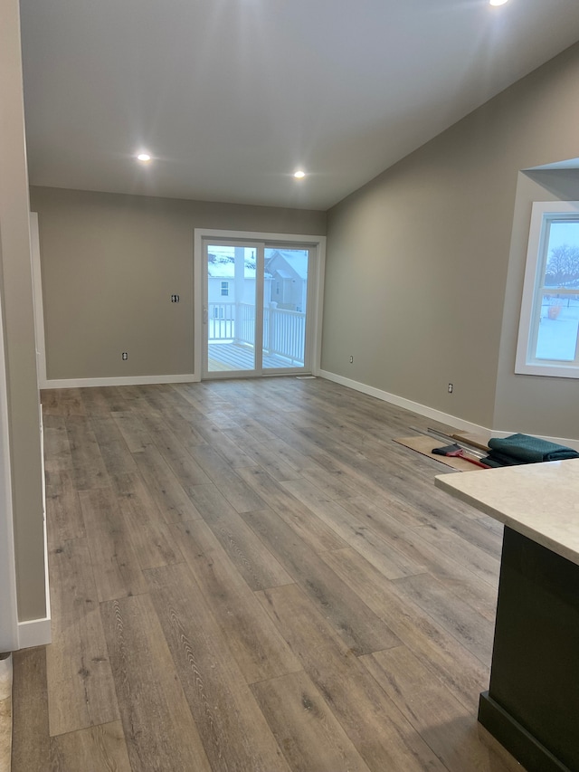 unfurnished living room with light wood-type flooring