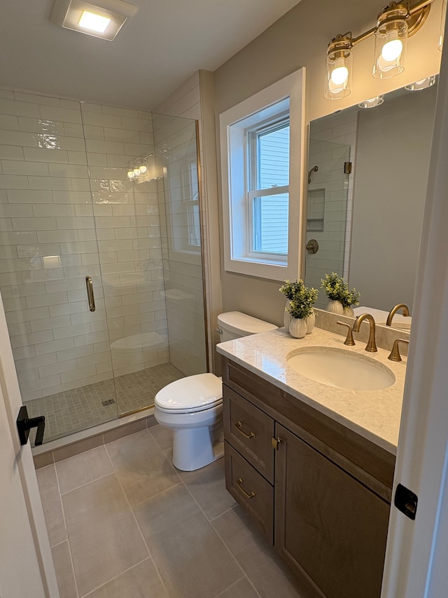 1430 N Mallard Cir, Owosso, MI 48867 - full bath with tile patterned floors, toilet, vanity, and a shower stall
