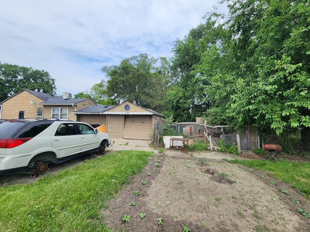 view of yard featuring a garage