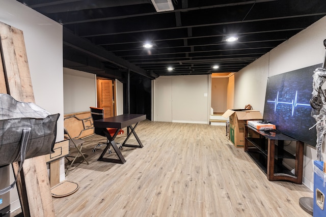 basement with wood-type flooring