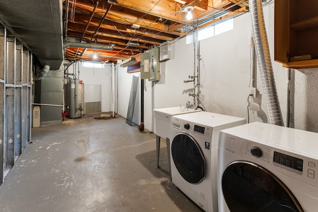 18230 Rainbow Dr, Lathrup Village, MI 48076 - laundry area featuring water heater and separate washer and dryer