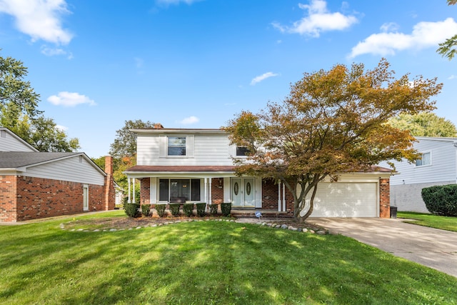 18230 Rainbow Dr, Lathrup Village, MI 48076 - traditional home featuring a garage, brick siding, driveway, a front lawn, and covered porch