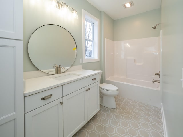 full bathroom featuring vanity, toilet, and shower / washtub combination