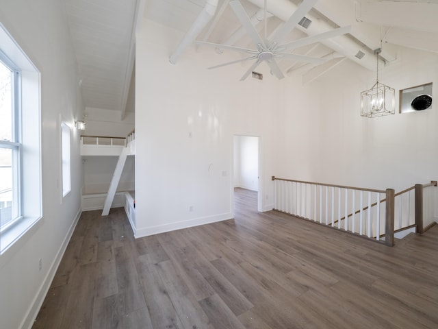 interior space with plenty of natural light and high vaulted ceiling