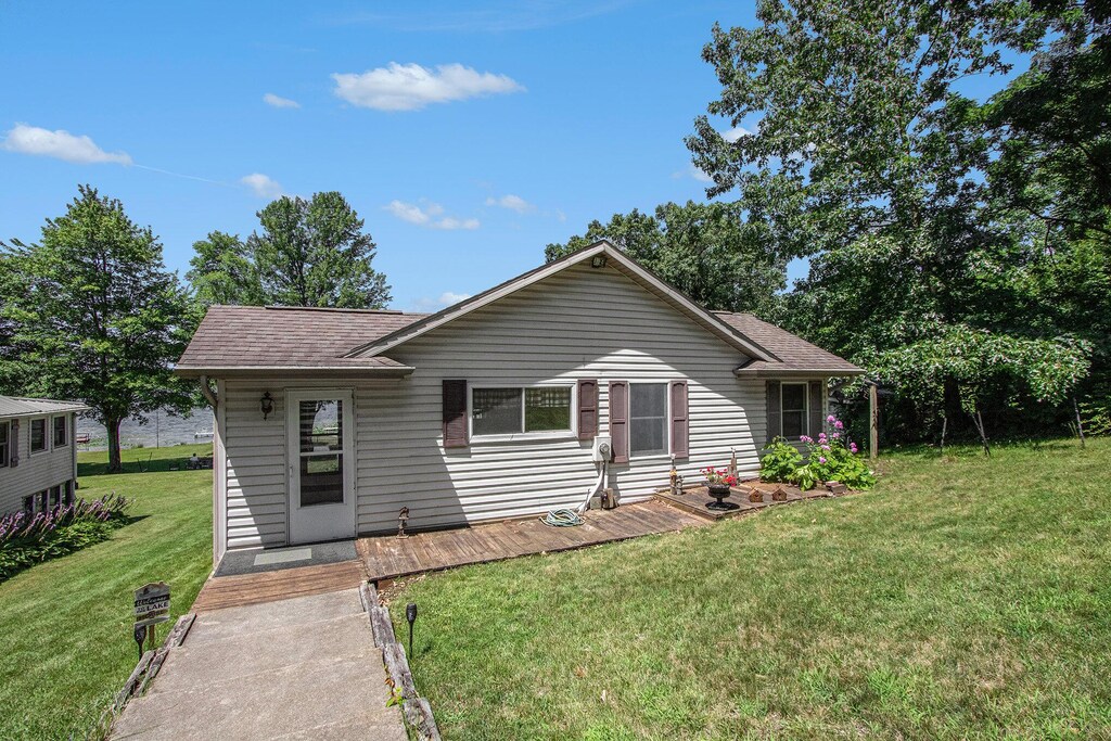 60748 Lilly Lake Dr, Jones, MI 49061 - view of front of property with roof with shingles and a front lawn
