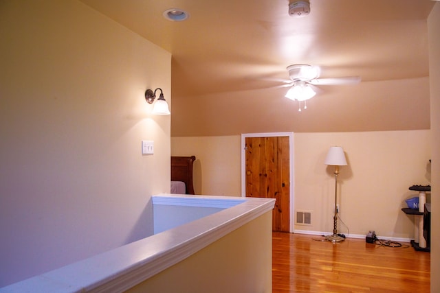 hall with light hardwood / wood-style flooring