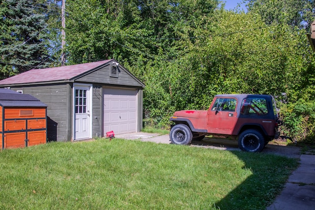 garage with a lawn