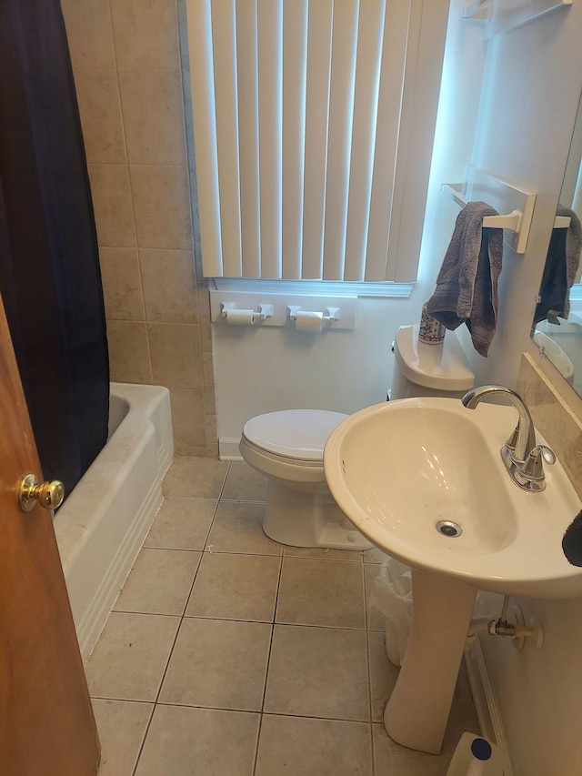 bathroom with toilet, tile patterned floors, and shower / bathtub combination with curtain