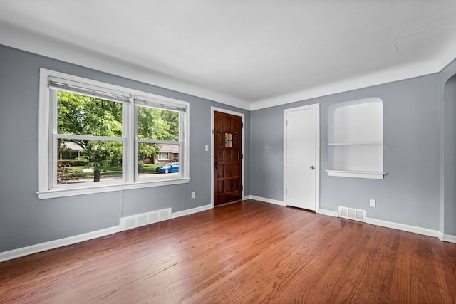 entrance foyer featuring hardwood / wood-style floors