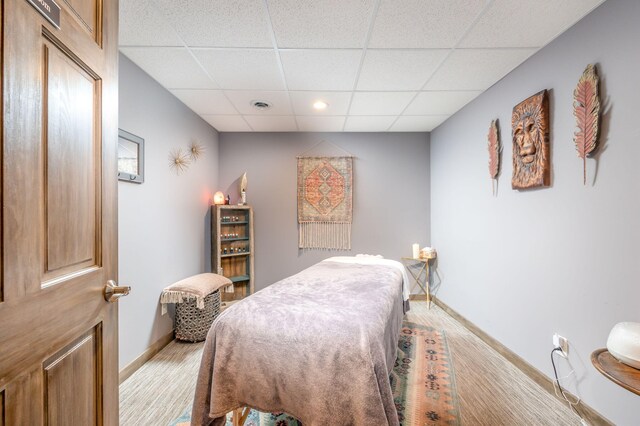 18564 200th, Tustin, MI 49688 - bedroom featuring a paneled ceiling, baseboards, and recessed lighting