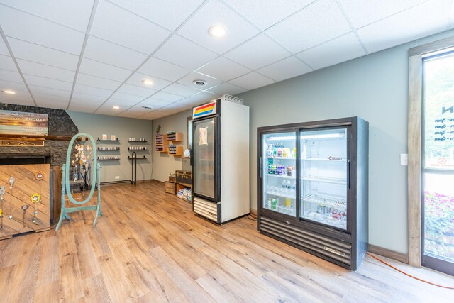 18564 200th, Tustin, MI 49688 - interior space with light wood-style floors, a drop ceiling, baseboards, and recessed lighting