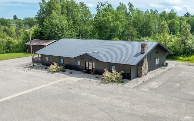 18564 200th, Tustin, MI 49688 - view from above of property with a heavily wooded area