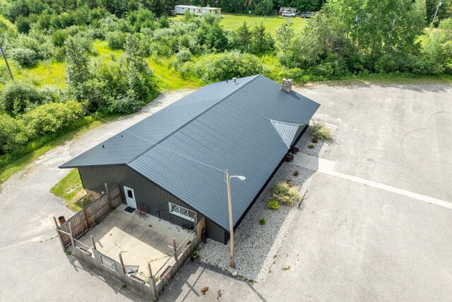 18564 200th, Tustin, MI 49688 - aerial view of property and surrounding area with a tree filled landscape