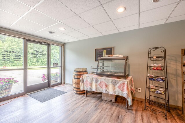 18564 200th, Tustin, MI 49688 - bedroom featuring a drop ceiling, wood finished floors, and baseboards
