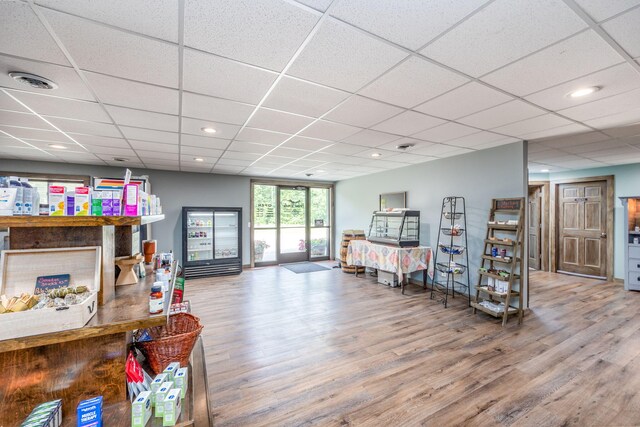 18564 200th, Tustin, MI 49688 - misc room featuring wood finished floors, a paneled ceiling, and recessed lighting
