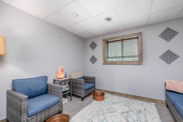 18564 200th, Tustin, MI 49688 - living area featuring a drop ceiling and baseboards