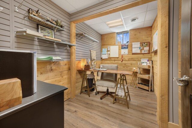 18564 200th, Tustin, MI 49688 - home office featuring wood walls, wood finished floors, and a drop ceiling