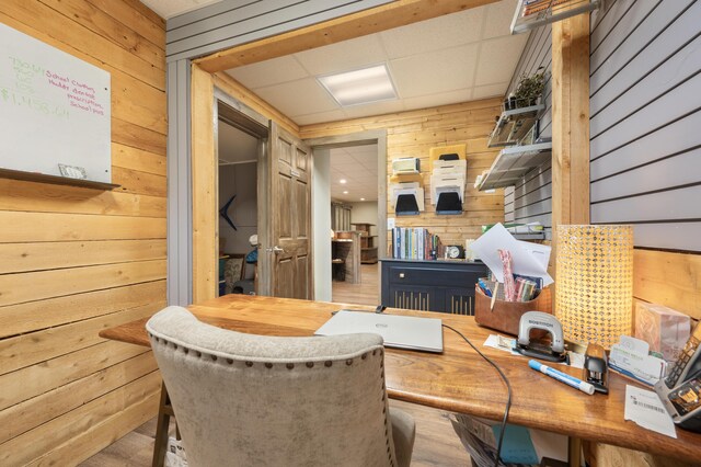 18564 200th, Tustin, MI 49688 - home office featuring wooden walls and a drop ceiling