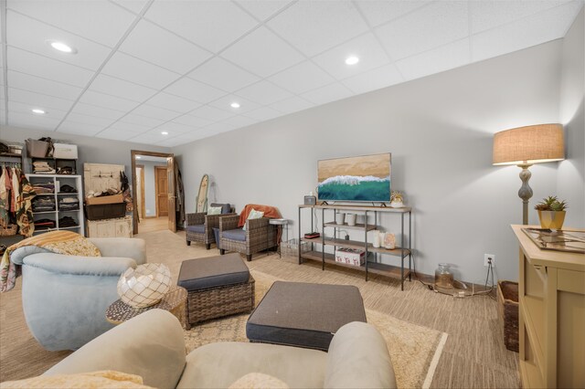 18564 200th, Tustin, MI 49688 - carpeted living area with a paneled ceiling, recessed lighting, and baseboards