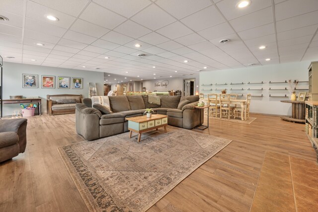 18564 200th, Tustin, MI 49688 - living room with a paneled ceiling, light wood-style flooring, and recessed lighting